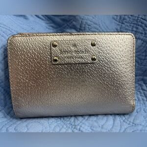 Authentic Kate Spade Wellesley Tellie Clutch wallet in metallic gold finish